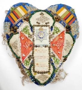 A Devonshire Regiment forget me not heart shaped sweetheart pin cushion, with various beaded detailing and Devonshire Regiment central shield, in a stained oak case, 19cm high, 30cm wide, 34cm deep. - 2