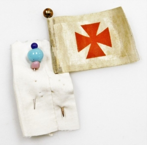 A Devonshire Regiment forget me not heart shaped sweetheart pin cushion, with various beaded detailing and Devonshire Regiment central shield, in a stained oak case, 19cm high, 30cm wide, 34cm deep. - 4