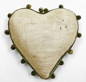 A forget me not sweetheart pin cushion, in the form of a heart with central crest for the King's Royal Rifle Corps, with outer beaded details and green pom poms, 18cm high, 18cm wide. - 2