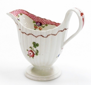 A late 18thC Newhall porcelain fluted cream jug, pattern number 173, with rose band decoration within scale borders, circa 1785, 11.5cm high. - 2