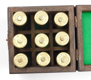 A group of nine novelty Ely shotgun cartridges, converted to storage bottles with plastic tops, in fitted case, together with an additional cheddite shell cased bottle and a pair of Culinary Concepts salt and pepper pots. - 4