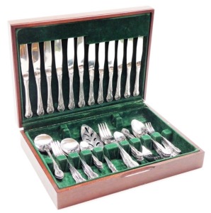 A Richmond stainless steel six piece canteen of cutlery, in mahogany and leather case.