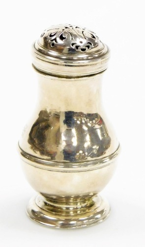 A George I Britannia silver pounce pot, of baluster form, with a scroll pierce lid and a raised band to body, on a stepped foot, London 1720, 2oz, 8cm high.