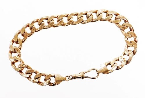 A 9ct gold curb link watch chain, the hollow curb links with clip clasp converted to bracelet, 21cm long, 11.5g.