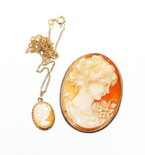 A group of 9ct cameo jewellery, to include a cameo brooch of young girl in a 9ct gold border, 4cm x 3cm, together with a modern cameo in a 9ct gold oval frame, on 9ct gold neck chain, 13.9g all in. (2)