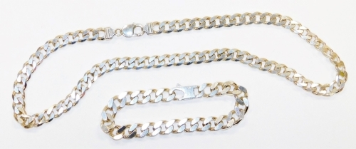 A silver necklace and bracelet set, comprising curb link neck chain, white metal stamped 925, 52cm long, and matching bracelet 20cm long, 127.8g all in. (2)