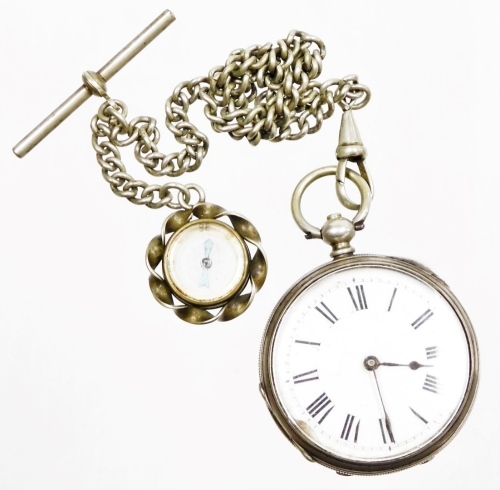 A silver pocket watch, with white enamel dial (AF), on a hammered outer casing with vacant shield, marked fine silver GS & Co, numbered 16875, with key wind, on a silver plated watch chain, 47.9g all in.