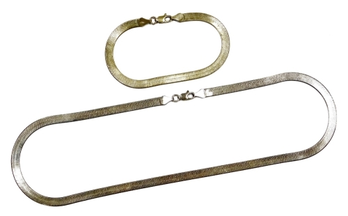 A 'liquid' silver necklace and bracelet set, with woven design, white metal, marked 925, 20g.