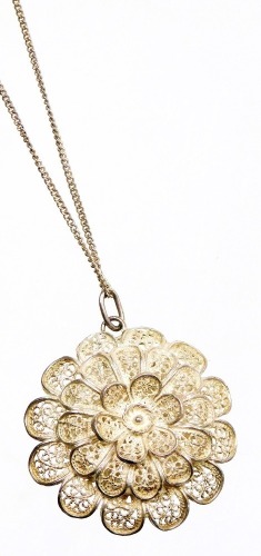 A filigree pendant and chain, the three layered filigree floral pendant, 3.5cm high, on a fine link chain, white metal stamped 925, the pendant unmarked, the chain 50cm long, 12.9g all in.