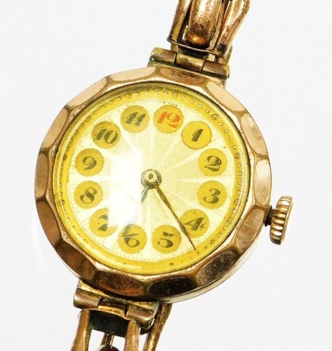 An early 20thC gold plated wristwatch, the circular watch dial with yellowed/silvered coloured finish, with blue hands in an outer gold plated case, on expanding gold plated strap.