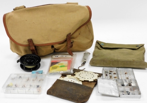 A Brady canvas fishing bag and other tackle, etc., to include a BFR Super Fly 995 fly fishing reel, flies, etc.