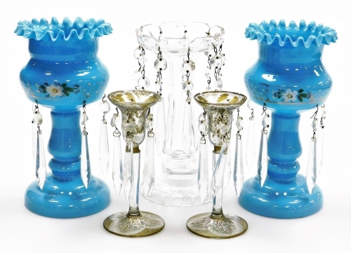 A collection of 19thC table lustres, to include a pair of blue opaque lustres, decorated with hand painted flowers, with glass drops, 22cm high, etc. (a quantity)