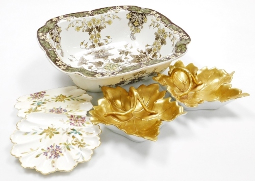 A Royal Doulton Birds and Wild Geranium pattern wash bowl, with a shaped edge, decorated with leaves, flowers, etc., 42cm wide, two porcelain side plates, with a shaped edge, hand painted with flowers, etc., with gilt highlights, blue stamp to underside a