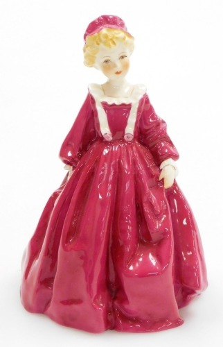 A Royal Worcester porcelain figure, titled Grandmothers Dress, modelled by F. G. Doughty, model number 3081, black stamp to underside, 17cm high.