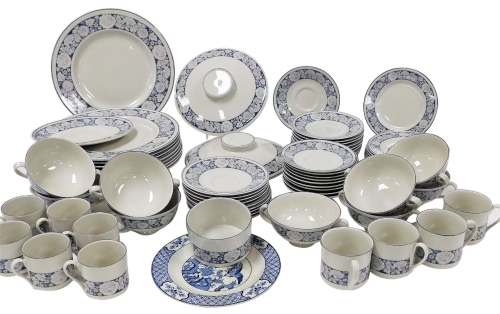 A Royal Doulton Oakdene pattern part tea and dinner service, comprising cups and saucers, tureen lids, dinner plates, gravy boats, saucers, etc. (2 trays)