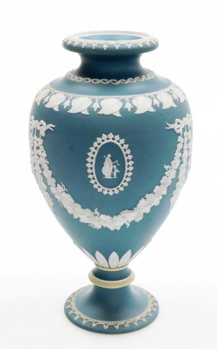 A late 19th/early 20thC turquoise Jasperware ovoid&nbsp;vase, decorated with cameos, swags, leaf and beaded decoration, etc., on a pedestal base, 25cm high.
