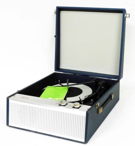 A Bush tabletop record player, model RP76, with instruction manuals.