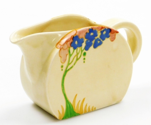 A Clarice Cliff Biarritz small jug, on a cream ground decorated with flowers, the underside stamped Royal Staffordshire England, 15cm wide.