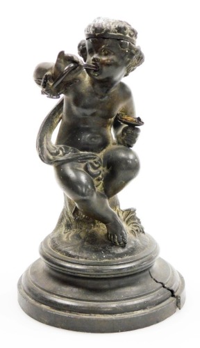 A 19thC bronze and pewter taper holder in the form of a putti, smoking a pipe and seated on a rock, the hinged lid to the head of the putti revealing a vacant interior for tapers, stamped Depose, on a pewter stepped base, 19cm high. (AF)