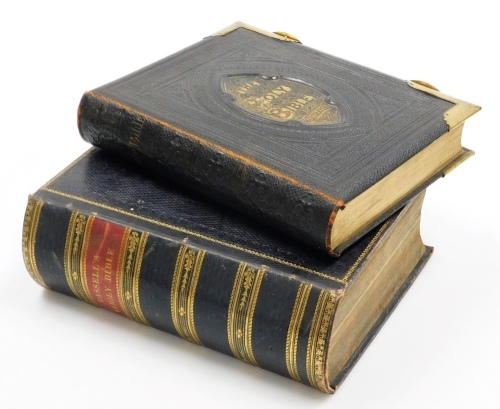 A leather bound self explaining family bible, with brass mounts, and a 19thC Cassells leather bound family bible, with gilt highlights. (2)