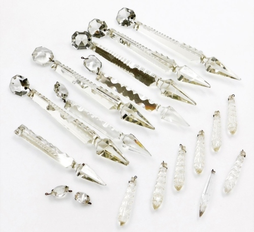 A quantity of glass lustre drops, the largest 19cm long.