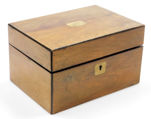 A 19thC walnut jewellery box, of rectangular form with metal escutcheon and cartouche, with part fitted interior, 14cm high, 24cm wide, 17cm deep.