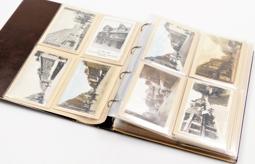 Postcards. Early 20thC Grantham, to include High Street, George Hotel, other local scenes, St. Peters Hill, The Market Place, The Bee Hive, Castlegate, other black and white and coloured scenes, etc. (1 album)