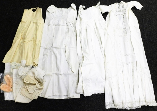 Various christening and day gowns, to include three christening robes made by Elsie Weldon for her children, the first born 1915, various other items, etc. (a quantity, sizes unknown)