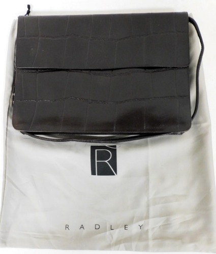 A Radley dark brown simulated crocodile skin briefcase or laptop bag, with a shoulder strap and fitted interior, with dustbag.