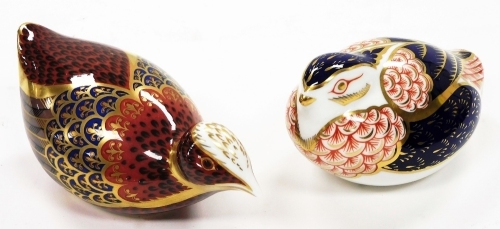 A Royal Crown Derby bird paperweight ornament, in Imari colours, 6cm high, and another with silver stopper. (2)
