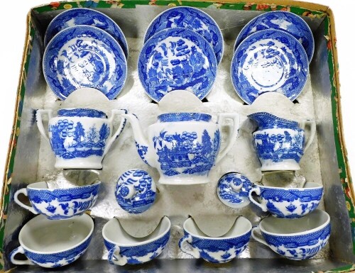 A 20thC child's boxed tea service, to include teapot marked Foreign Porcelain, 9cm high, in Willow pattern with cups, two handled sugar bowl, saucers and jug, settings for six. (partially boxed)