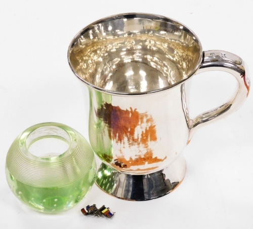 An early 20thC glass match striker, with striker top 5cm high, and an Old Sheffield Plate cup marked Nottingham, initialled TR. (2)