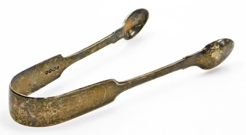 A pair of Victorian fiddle pattern silver sugar bows, with plain bowls, London, probably 1858, 14cm wide.