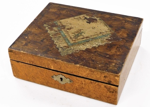 A 19thC painted pine jewellery box, of rectangular form with polychrome lid and plain interior, 19cm wide.