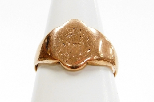 A 9ct gold gents signet ring, with shaped oval panel bearing the initials HB, with later join, ring size R&frac12;, 4.8g, boxed.