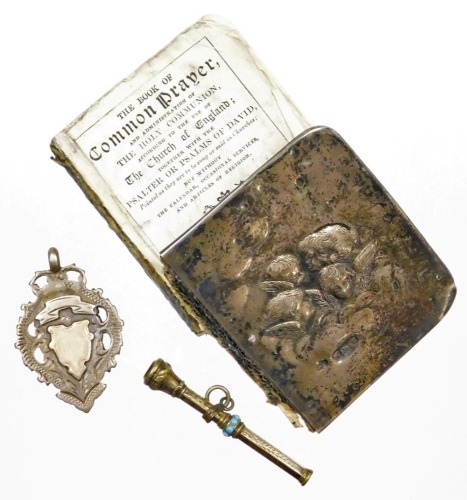 A group of silver and effects, to include a silver fronted bible, silver shield fob, and a silver and turquoise set pencil topper, 39.3g all in. (3)