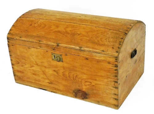 A 20thC dome topped pine trunk, with metal carrying handles and plain interior, 34cm high, 81cm wide, 50cm deep.