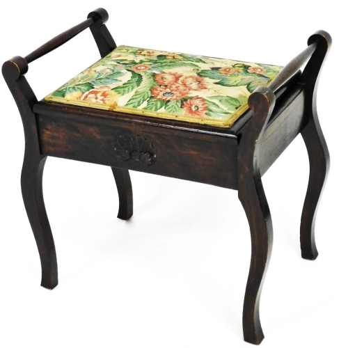 An Edwardian stained piano stool, of rectangular form, with hinged embroidered seat and cylindrical handles, 54cm high.