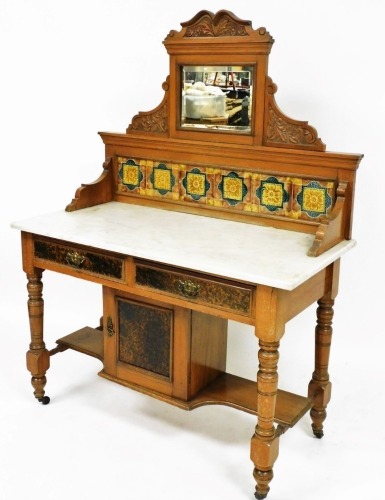 An Edwardian mirror and tile back marble top wash stand, of rectangular form, on turned front legs, with two frieze drawers above a single cupboard, and satin walnut frame, 145cm high, 108cm wide, 48cm deep.