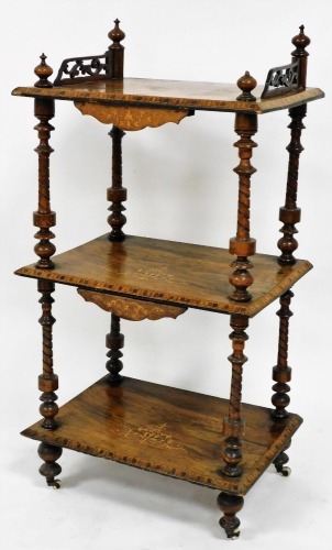 A Victorian walnut and chequer banded three tier whatnot, the part galleried top section raised with two further sections broken by turned columns on turned legs with a Tunbridge style outline, 107cm high, 54cm wide, 40cm deep.