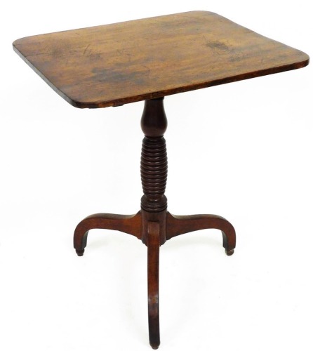 An 19thC mahogany tilt top occasional table, on a heavily carved turned stem terminating in triple legs, 101cm high, 48cm wide, 39cm deep.