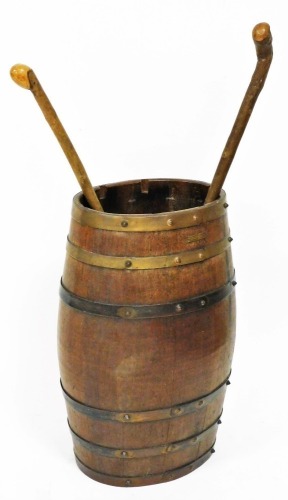 A 20thC stick barrel constructed from the teak of HMS Iron Duke, partially metal bound and of oval form, 62cm high, and various other items. (a quantity)