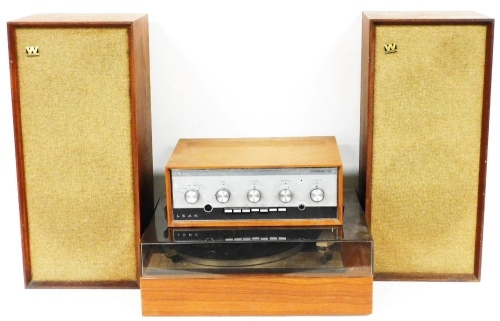 A Goldring Lanco GL75 turntable, with Perspex top, 44cm wide, two Wharfedale speakers and stereo 70, in teak casing, Triton stickers one marked 7W/16122A.