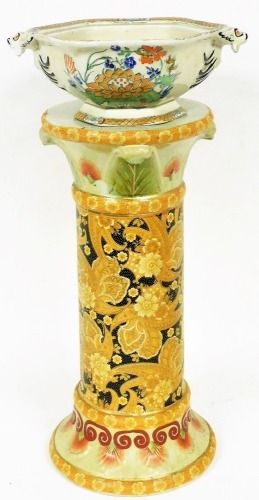 A pottery jardiniere stand, of cylindrical form, with plain circular top, 21cm diameter, decorated with floral scrolls, and a Masons style open dish. (2)