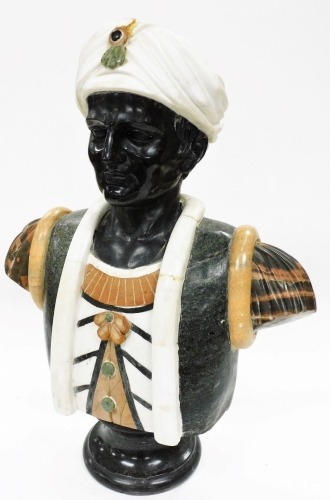 A specimen marble Blackamoor bust, quarter profile, dressed in finery, on a circular base, 75cm high.
