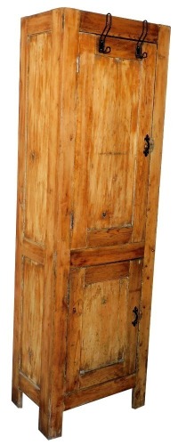 An early 20thC pine cupboard, with added metal pegs, the upper section with shelved interior, above a cupboard beneath, on block stiles, with panelled sides, 193cm high, 66cm wide, 39cm deep.