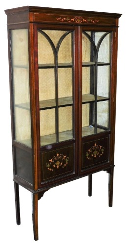 An Edwardian mahogany boxwood strung and partially painted display cabinet, the astragal glazed doors revealing fitted shelves above painted panels beneath, on square legs, 162cm high, 89cm wide, 32cm deep.