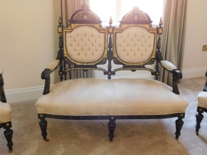 A fine early 20thC French ebonised salon suite, Inc. two & three seater open arm sofas, pair of tripod candle stands/wine tables, narrow display cabinet, 133cm high, 48cm wide, 29cm deep, two plus three open armchairs, oval coffee table, 48cm high, 107cm - 22
