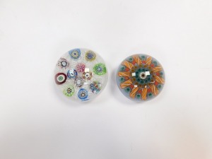 A Perthshire 1973 dated millefiori and scrambled cane paperweight, decorated with silhouette motifs, 7cm diameter, together with a millefiori and tubular cane paperwork, 6.5cm diameter. (2, AF) - 4