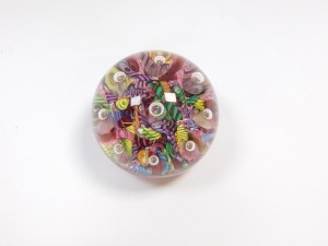 A Paul Ysart Magnum harlequin glass paperweight, circa 1970, with scrambled polychrome canes and nine air bubbles, 7cm diameter. - 4